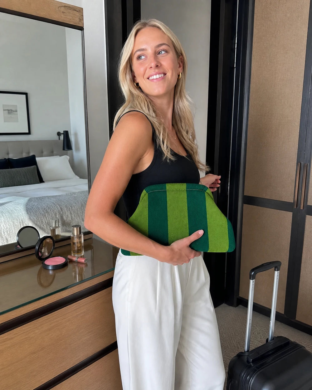 3 Reasons This Snap-Shut Bag Replaced My Makeup Bag, My Clutch, and My Travel Pouch