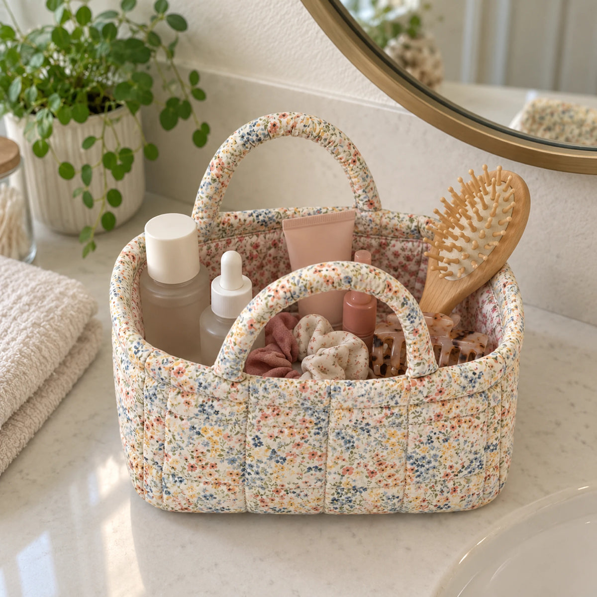 Mini Quilty holding the small things on a vanity