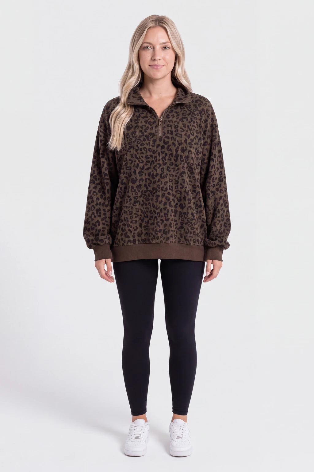 Woman wearing the oversized ribbed quarter zip sweatshirt