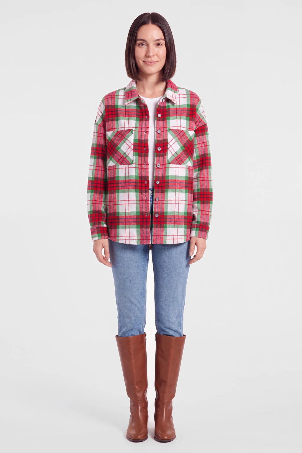 Woman wearing the Christmas plaid flannel shacket