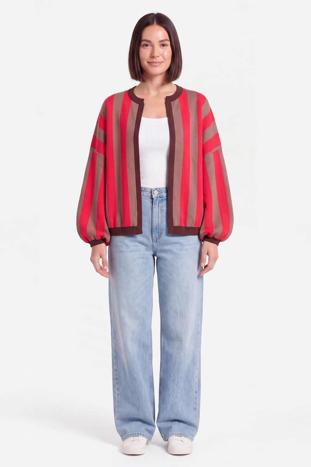 Woman wearing the striped balloon sleeve cardigan, open
